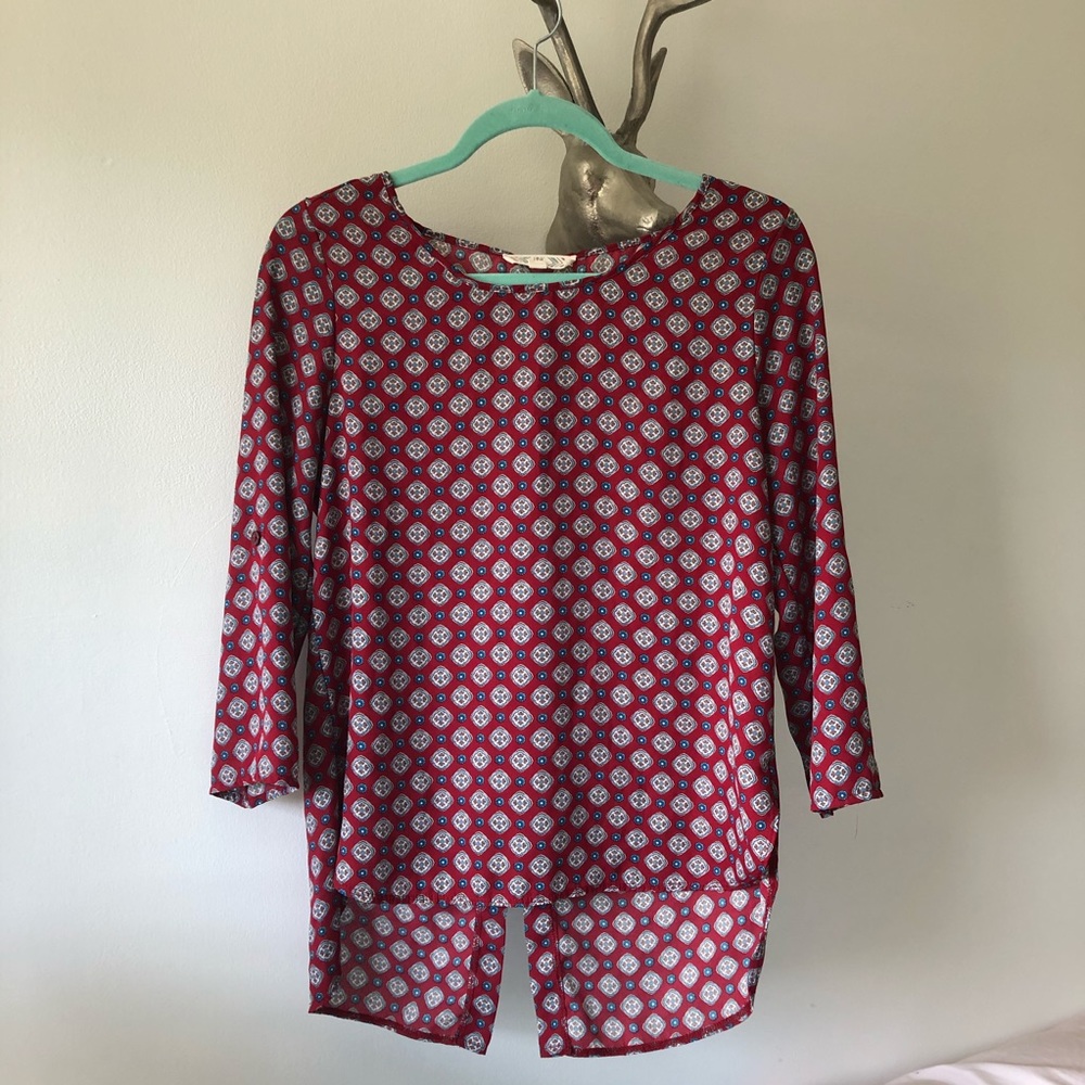 Pink Rose high- low style Patterned blouse.